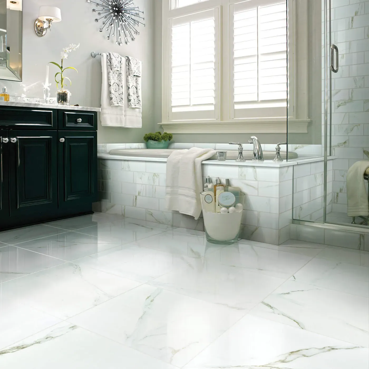 Shaw Floors Calacatta Oro polished white marble-look tile in a luxurious bathroom | Fantastic Floors