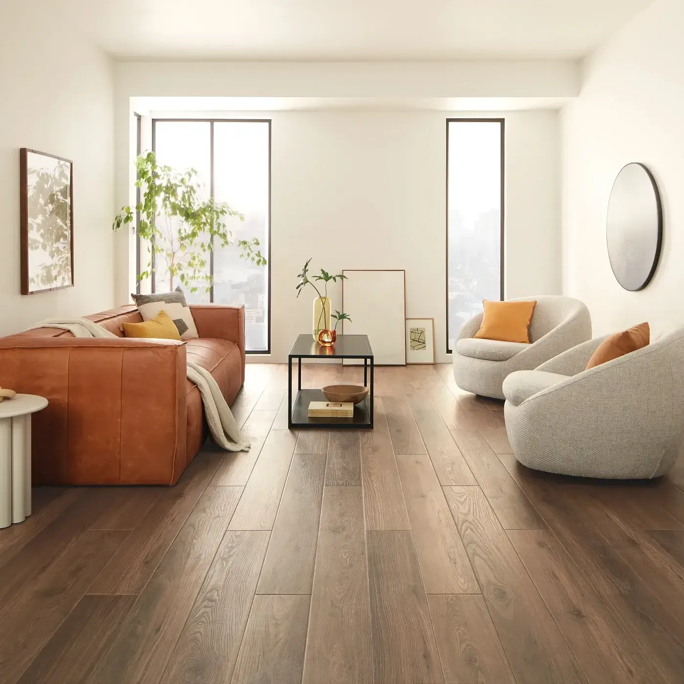 COREtec Luxury Vinyl in a dark brown wood tone in a bright living room | Fantastic Floors