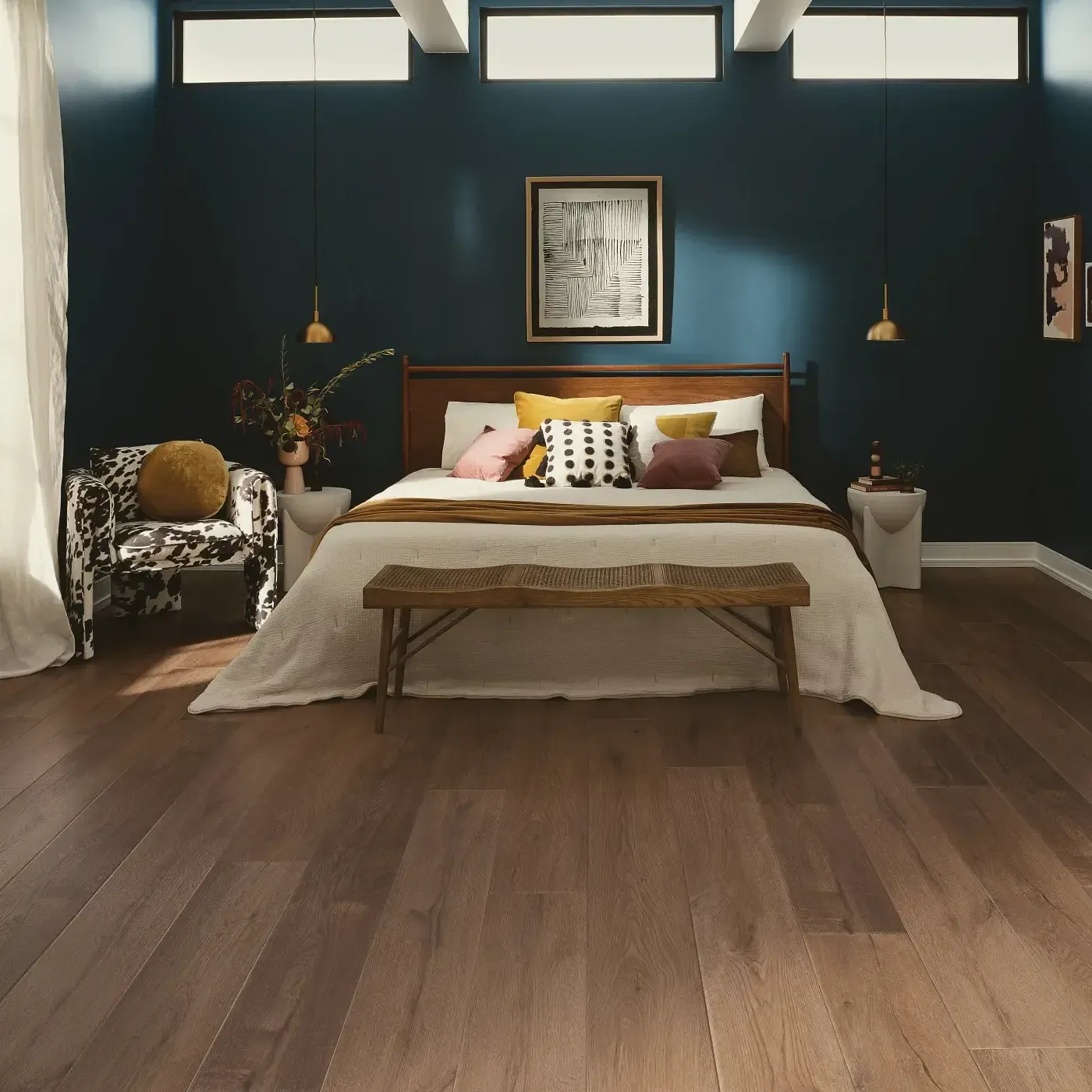 COREtec Luxury Vinyl in a medium brown wood tone in a bedroom | Fantastic Floors